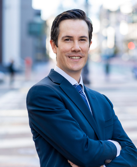 John J. Roach in professional attire