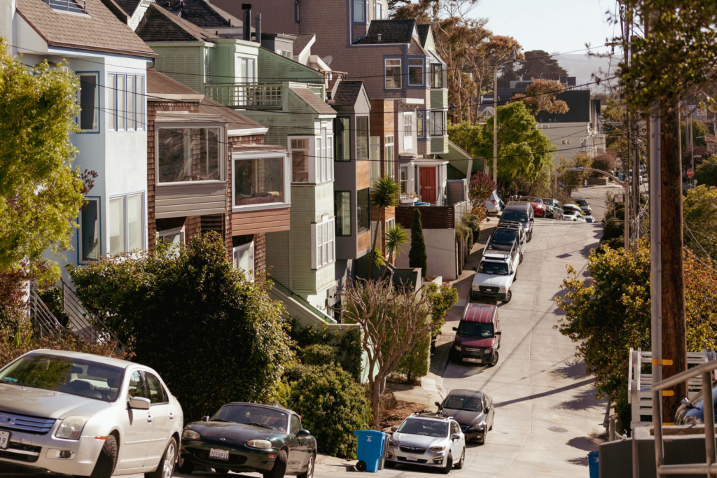 Bernal Heights neighborhood street with parked cars and residential homes — San Francisco personal injury attorney John J. Roach serves Bernal Heights accident victims