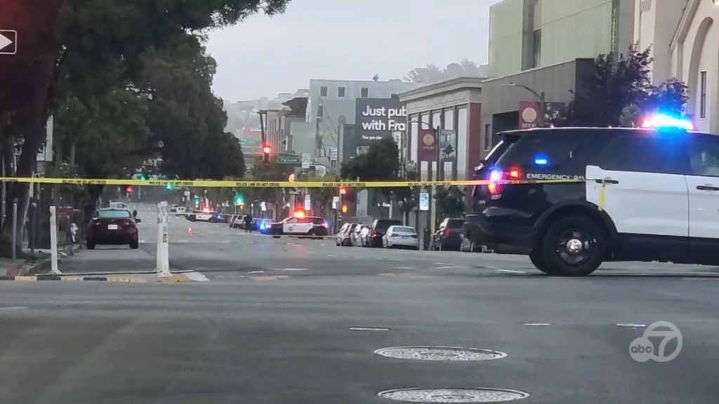 Police responding to accident scene in SoMa San Francisco with emergency vehicles and police tape — personal injury attorney John J. Roach serves accident victims in SoMa