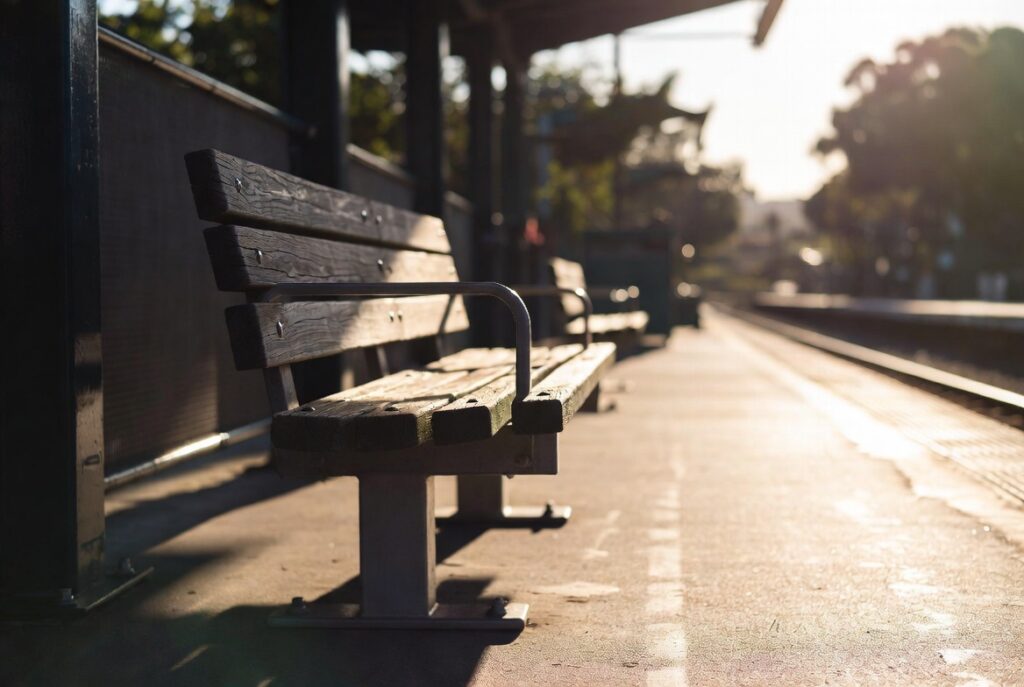 Empty bench at Bay Area transit station — six-month government tort claim deadline for BART, Muni, and SamTrans wrongful death cases