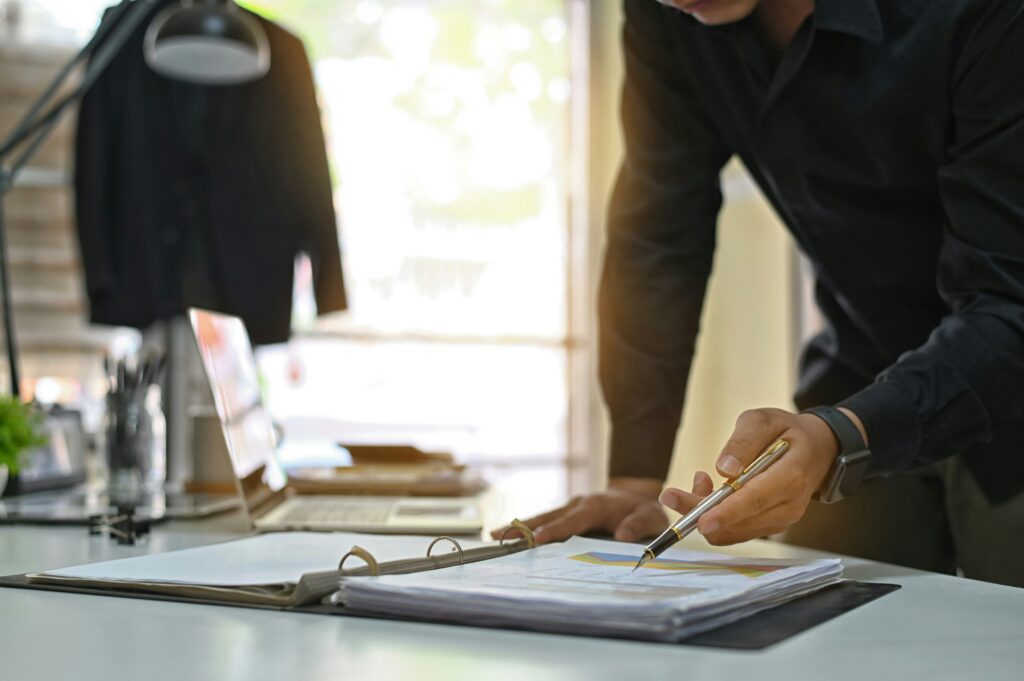 San Francisco personal injury attorney John J. Roach reviewing California Prop 213 uninsured driver injury case