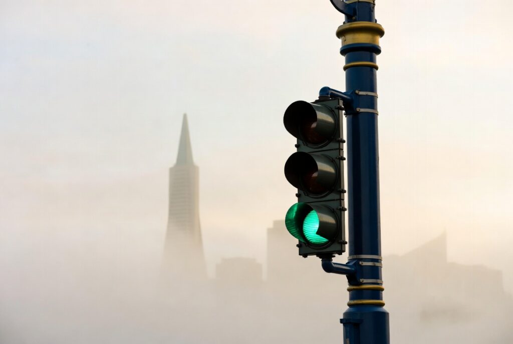 Green light without a protected arrow — the unprotected left turn that causes San Francisco crashes