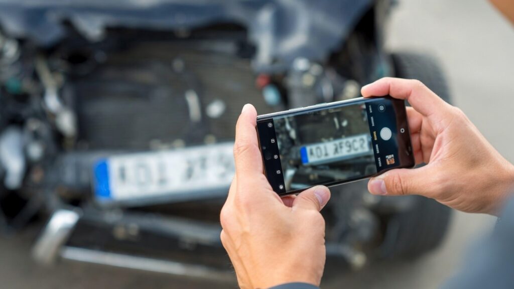 Photographing a delivery van's license plate after an accident in San Francisco