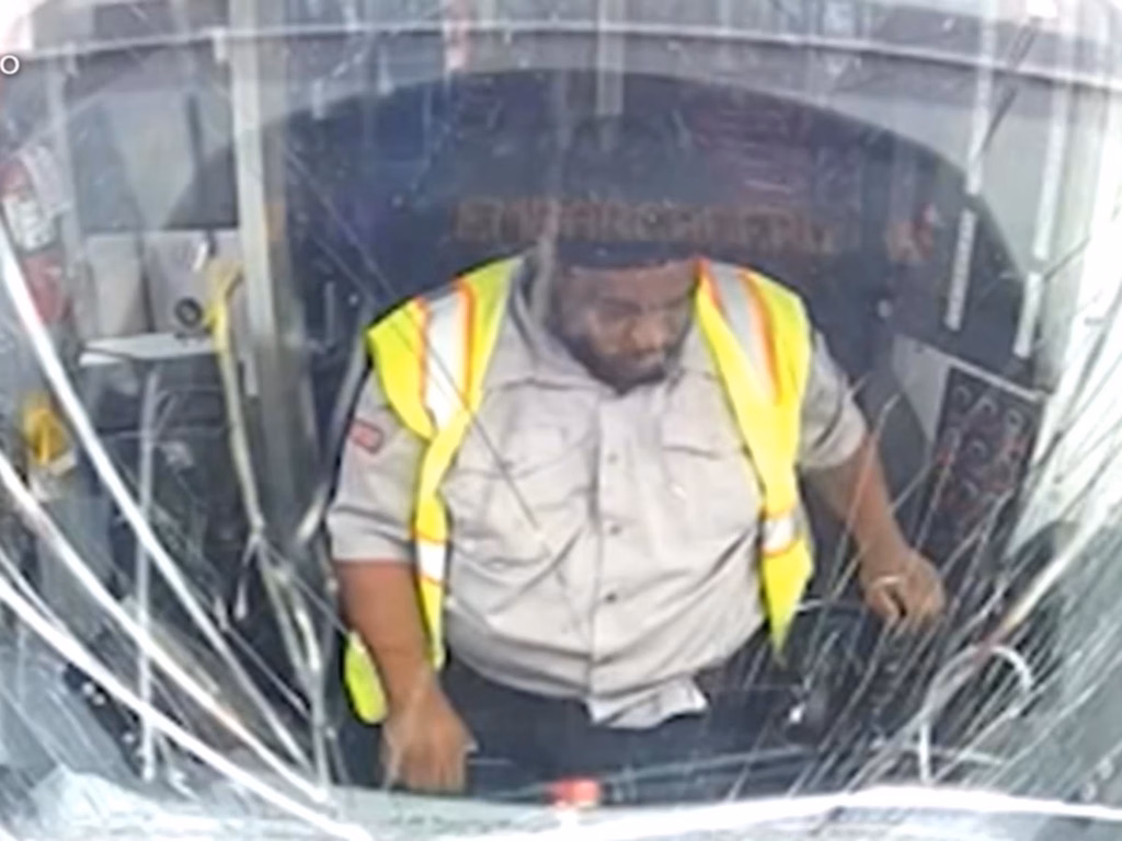 Shattered train window after a Muni operator fell asleep and collided with a stopped train