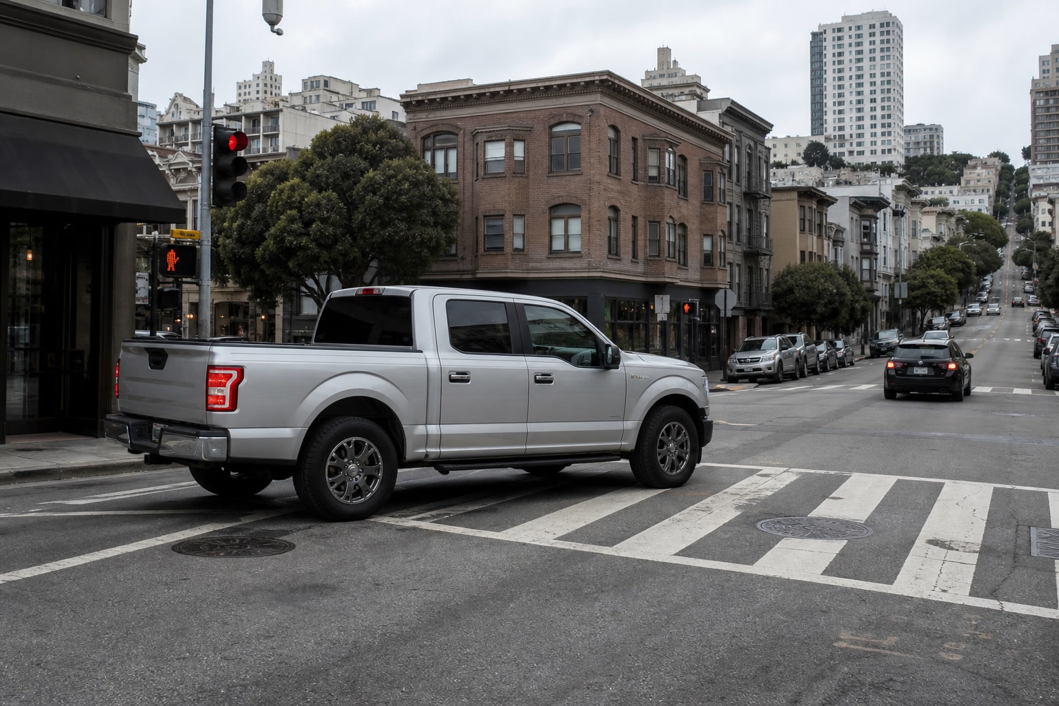 Ford F-150 pickup in a San Francisco crosswalk on an overcast day