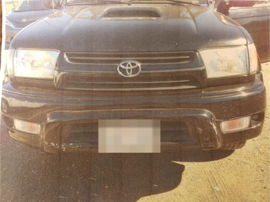 The truck that rear-ended Peery, photographed after the collision — minimal visible damage