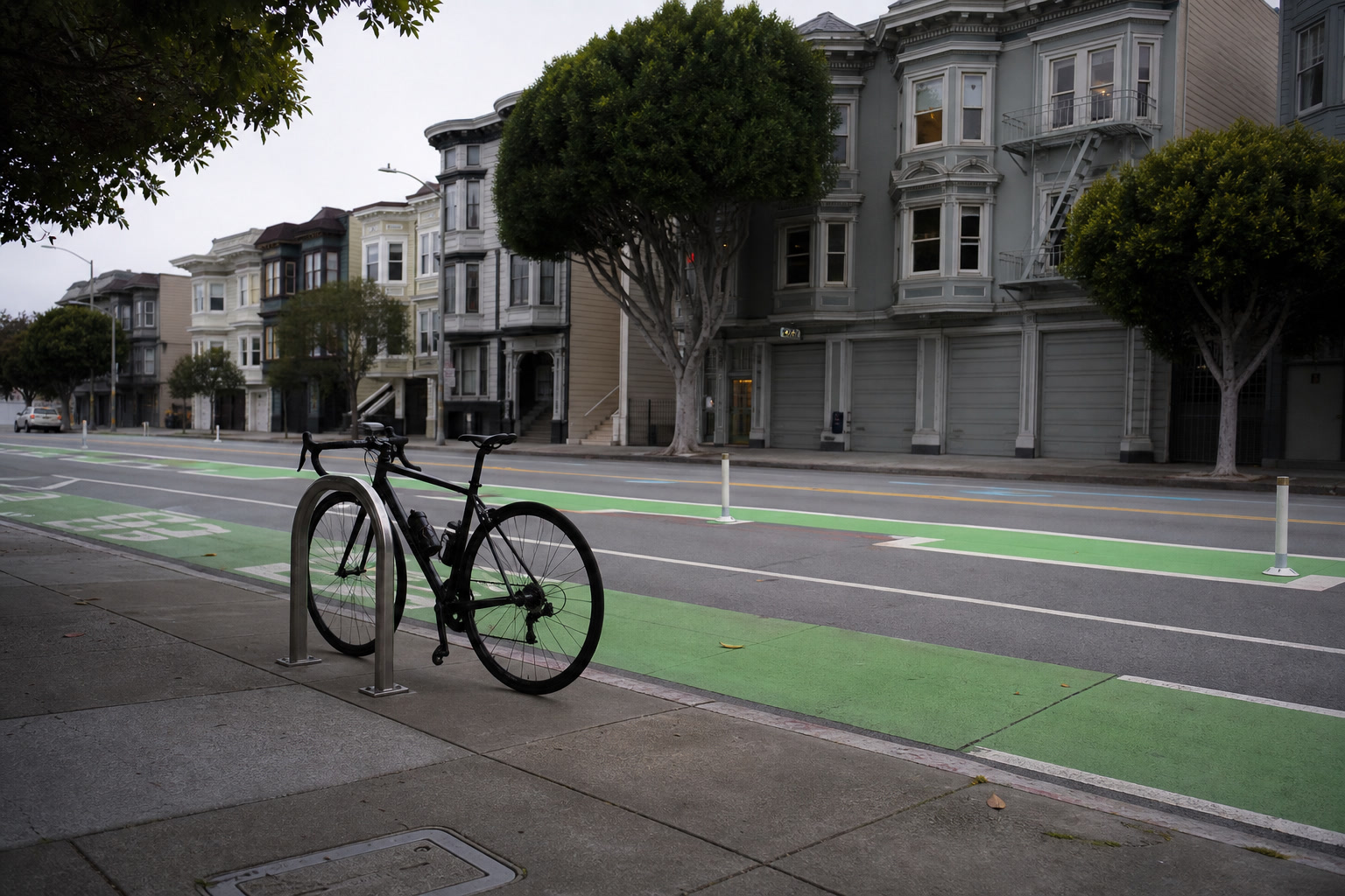 Road bike locked beside a San Francisco green bike lane