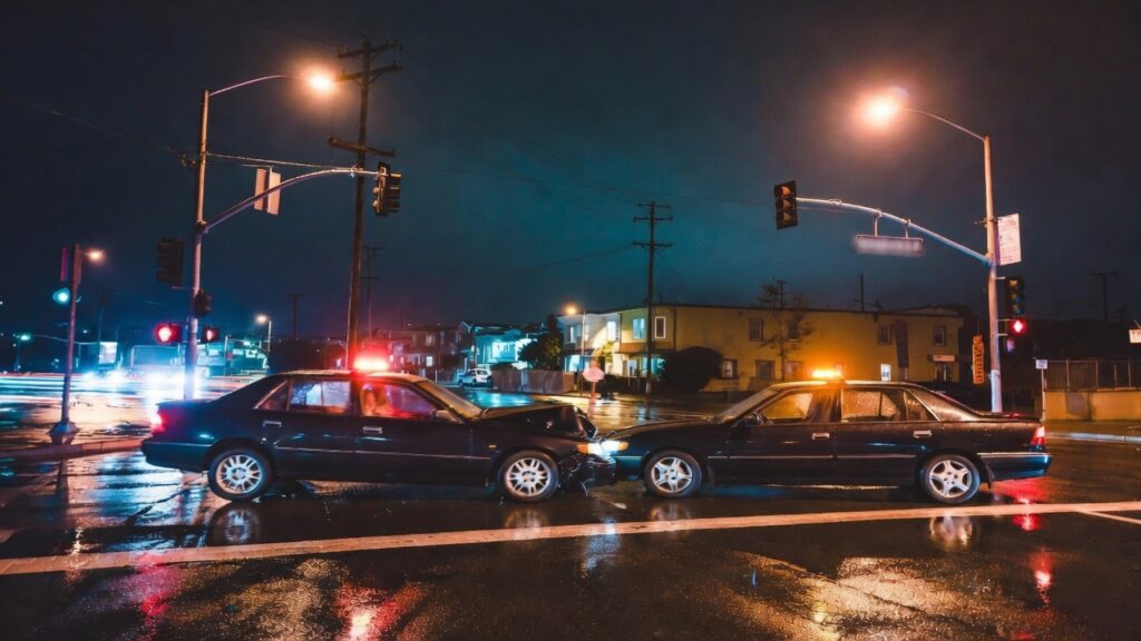 Intersection collision involving a rideshare vehicle in San Francisco at night